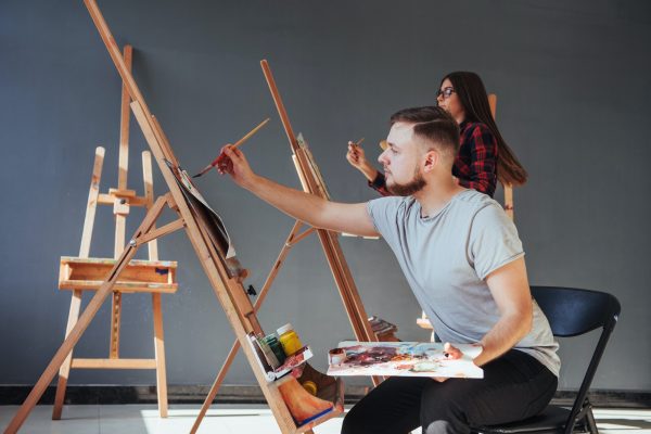 group-of-students-painting-at-art-lessons.jpg